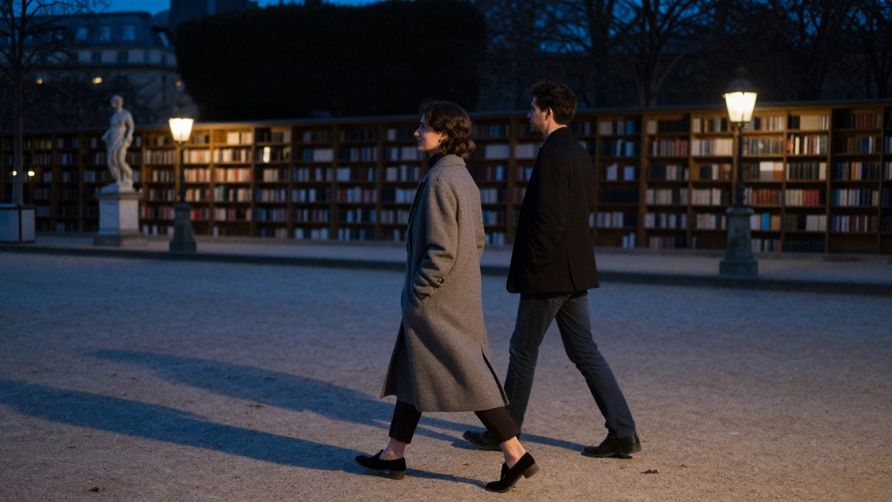 A man and woman walking peacefully through Luxembourg Gardens in Paris under moonlight.